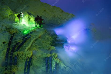 Premium Photo Blue Flame In Sulfur Mining At Night Kawah Ijen