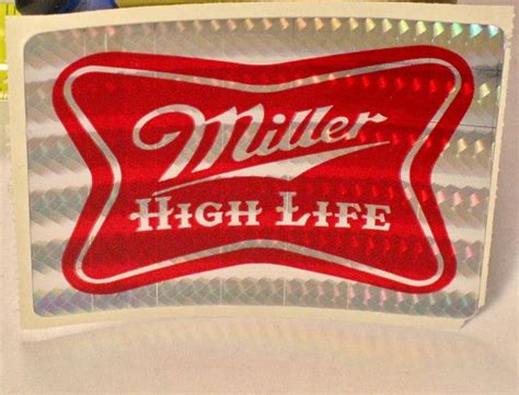 A Miller High Life Sticker On A Table