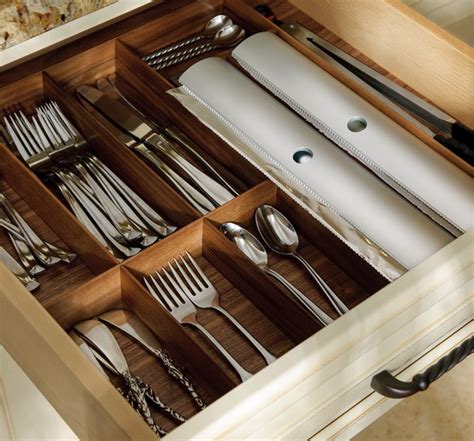 Each one of these genius kitchen drawers and cabinets is designed to solve a specific kitchen storage problem. Give your drawer a sleek look with razor-thin walnut ...