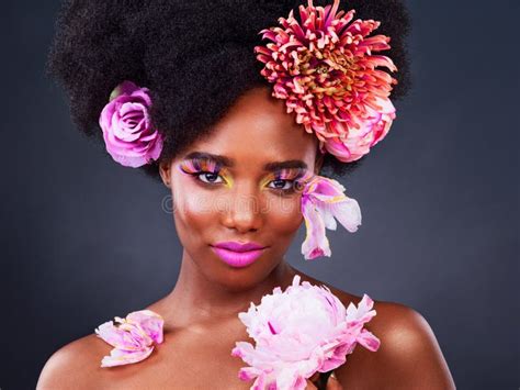 Beauty Flowers And Portrait Of Black Woman In Studio For Makeup Creative And Spring Natural