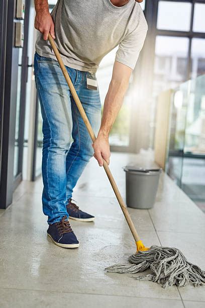 Best Man Mopping Stock Photos Pictures And Royalty Free Images Istock