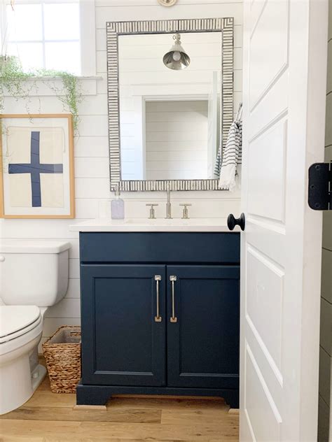 Cabinet painting is a relatively inexpensive way to change up a room. Painting Bathroom Cabinets: A Beginner's Guide - Chrissy ...