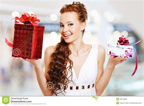Happy Smiling Woman With Birthday Present In Hands Stock ... Among these collections of happy birthday images you'll find the one that suits your case best.