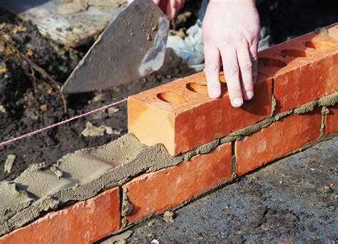 You could use a construction addhesive like liquid nails or use brick anchors. Troubleshooting exterior masonry walls - Construction ...