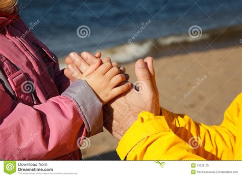 Child Holds Hand Of Adult Stock Image Image Of Assistance 13022109