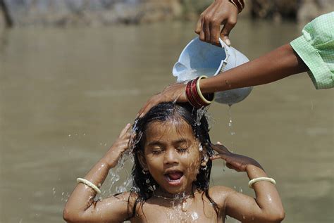 Girl Bathing In A River Bastar License Image 70290833 Lookphotos