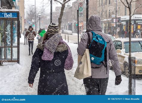 Snowstorm In Montreal Pedestrians On Mont Royal Avenue Editorial Photo