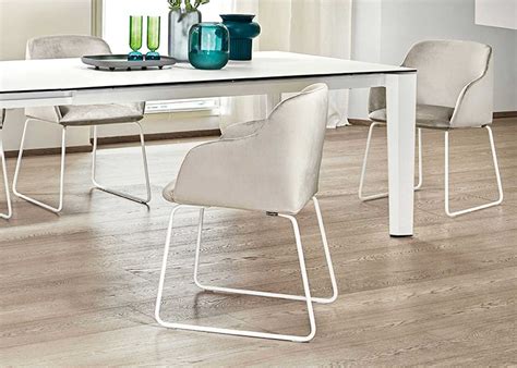 Oleandro is a padded chair with a metal base. Calligaris Elle Upholstered Dining Armchair - Midfurn ...
