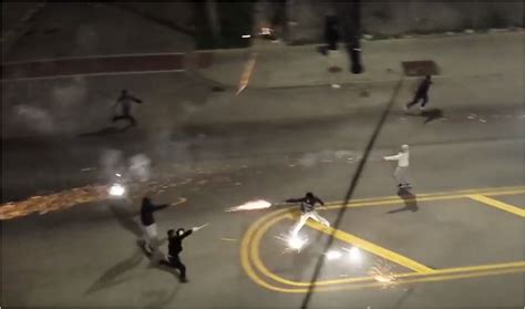video chicago gangs battle in street with roman candles