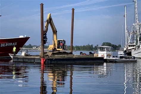 Building a travelift launching pier in ocean world marina, puerto plata dominican republicmarine construction in the dominican republic. Photos From On The Cover Of TownDock.net, Oriental, NC