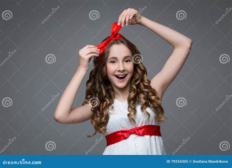 Surprised Teen Girl With Red Bow On Head Stock Image Image Of