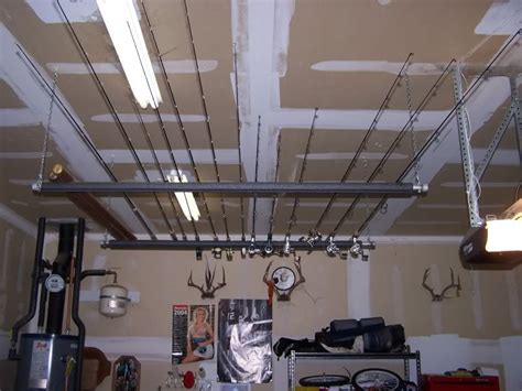 Love this idea for storing fishing rods in your garage! garage fishing rod storage ideas - Google Search | Fishing ...
