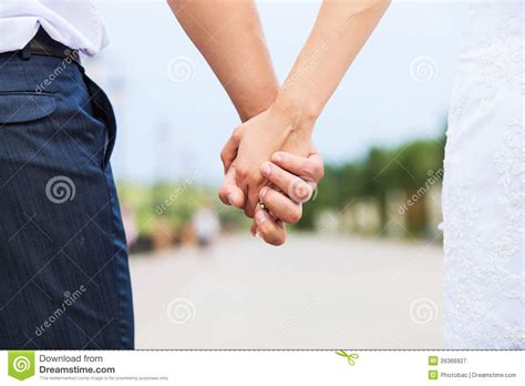 Wedding Photo Of Married Couple Holding Hands Royalty Free