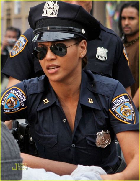 This Is A Picture Of Beyonce In A Cop Costume For Her Music Video “if I