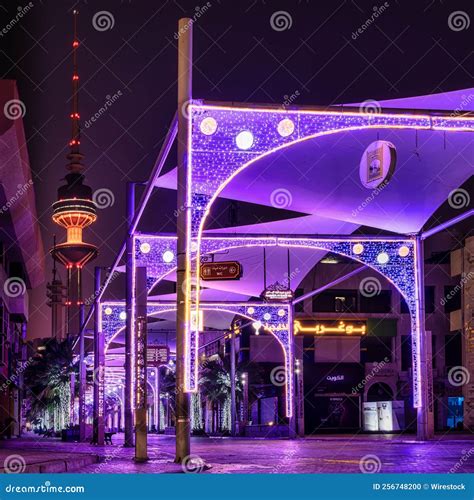 Shot Of A Purple Lighten Shopping Street With The Liberation Tower At