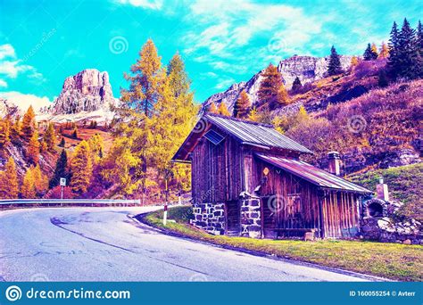 Breathtaking Beautiful Autumn Landscape With Wooden House On Background