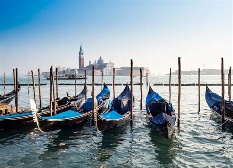 Premium Photo Gondolas With San Giorgio Di Maggiore Church In Venice