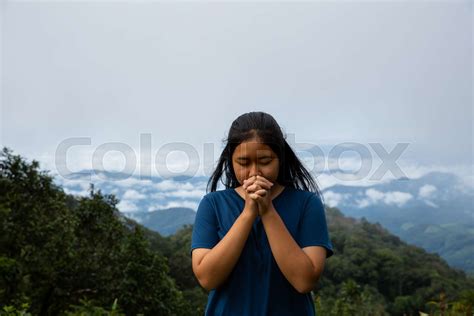 Girl Enjoying Nature And Praying To God Stock Image Colourbox