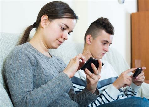 Mother And Son With Smartphones At Home Stock Image Image Of Indoor