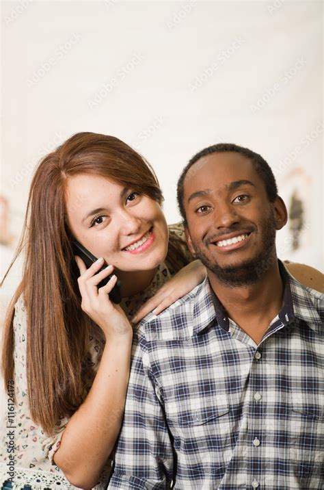 Interracial Charming Couple Wearing Casual Clothes Posing Interacting