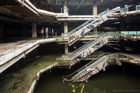 They used to, because otherwise too many mosquitos would live in the mall and terrorize the neighborhood. Abandoned shopping mall New World with fish in Bangkok (1 ...