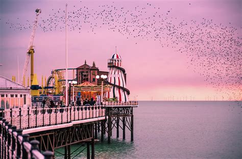 Brighton Pier At Sunset Photograph By Marius Comanescu Fine Art America