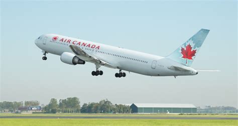 Air Canada to temporarily lay off 15,000 workers due to ...