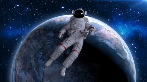 Astronaut Floating Back Above Planet Earth Cosmonaut Drifting In Space