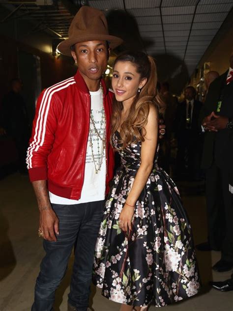 Pharrell Williams And Ariana Grande Cuddle Up At The Grammys Pictures