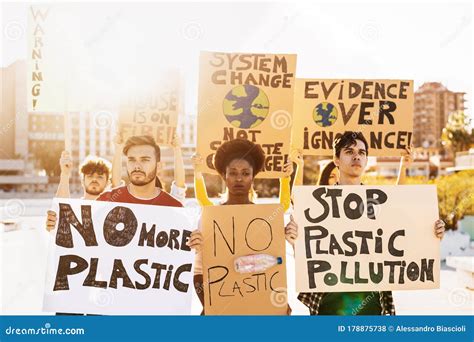Group Demonstrators Protesting Against Plastic Pollution And Climate