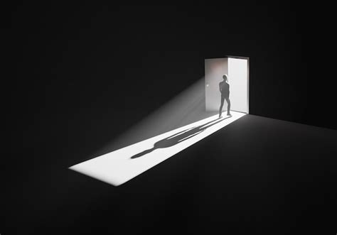 Premium Photo Man Walking Out Of A Dark Room Through Opened Door