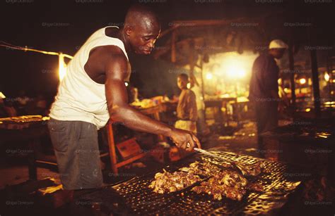 street vendor yopougon township near abidgan ivory coast africa nigel dickinson