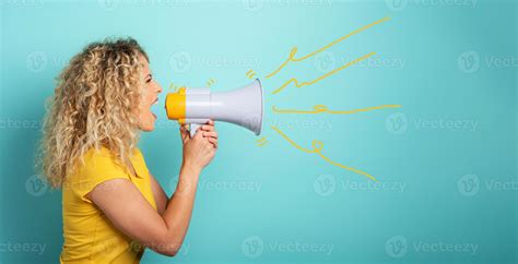 Woman Screams With Loudspeaker Angry Expression Cyan Background