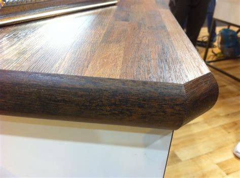 Solid wood kitchen cabinets do not necessarily need to be stained wood — but depending on the coarseness of grain patterns, some laminate kitchen cabinets come in a variety of colors and finishes to meet the design needs of almost any kitchen. Wilsonart wood grain laminate - somebody called it ...