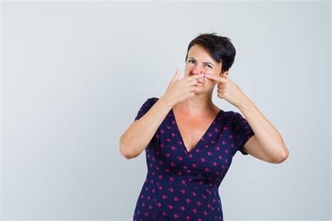 Free Photo Woman In Dress Squeezing Her Pimple On Cheek