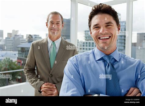 Two Businessmen In Office Portrait Stock Photo Alamy