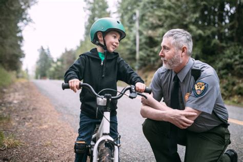 380 Police Officer Helping Child Stock Photos Pictures And Royalty Free