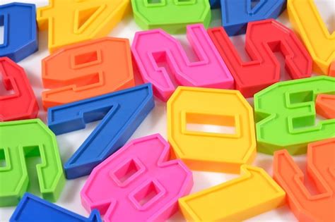 Premium Photo Colorful Plastic Numbers Close Up On A White