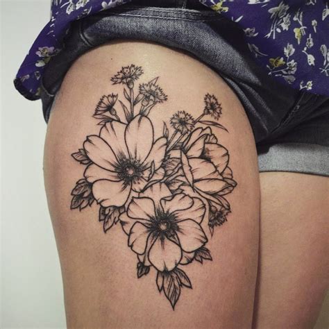 Interesting Black Contour Flowers Tattoo On Thigh Tattooimagesbiz
