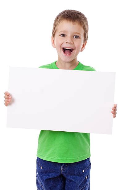 Child Holding Blank Sign Stock Photos Pictures And Royalty Free Images