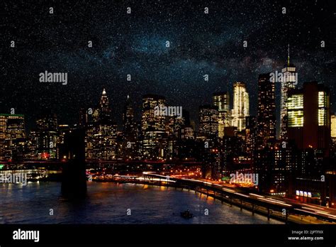 Galaxy Of Stars Shining In The Night Sky Above The Buildings Of New
