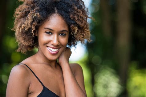 This look, featuring brown hair with blonde highlights, weaves the blonde in from all points on the head. 7 Blonde Afro Ideas for the Bleach-Happy Curlfriend
