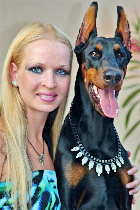 Woman With A Doberman Pinscher Free Image Download
