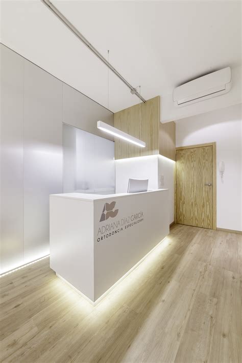 Healthcare design dental reception reception desk design office reception reception table clinic interior design. Gallery of Dental Clinic Adriana García / NAN arquitectos - 9