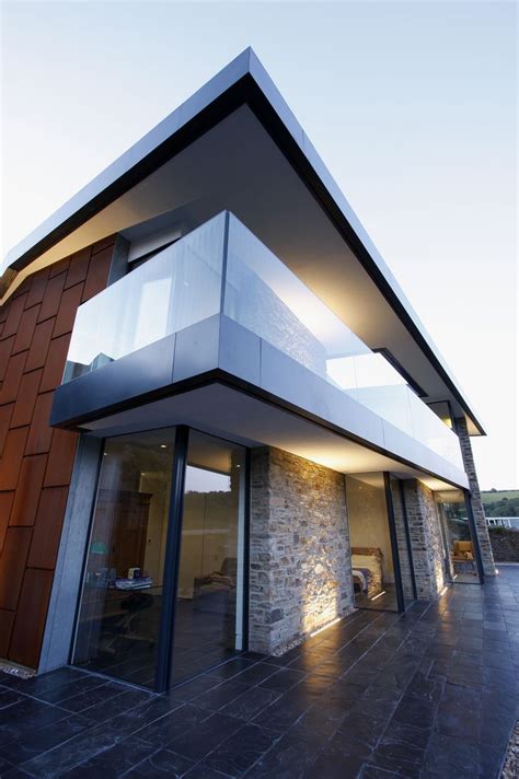 Glass to glass corner windows. sliding minimal windows and fixed structural elements ...