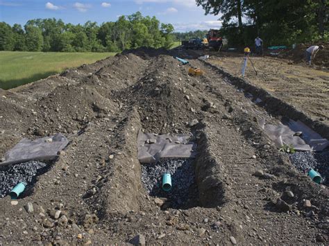 The treated wastewater seeps from the pipes, into the gravel and slowly makes its way into the soil. 5. Site Development | New Hudson Valley