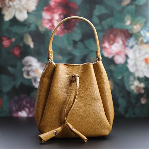 Leather Drawstring Mini Handbag Yellow By The Leather Store