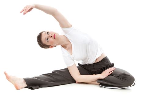 Flexible Woman Doing Seated Yoga Pose