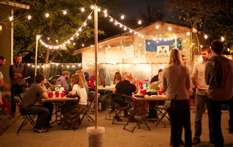 Decorative string lighting fastened inside an umbrella provides inexpensive illumination for outdoor entertaining. Backyard party entertainment | Outdoor furniture Design ...