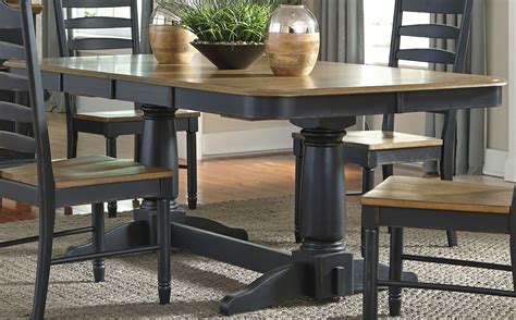 Featuring a double pedestal table base with an extendable table top, it is accompanied by side chairs with graciously rolled back dressed in a premium grey chenille fabric. Springfield II Honey and Black Extendable Double Pedestal ...